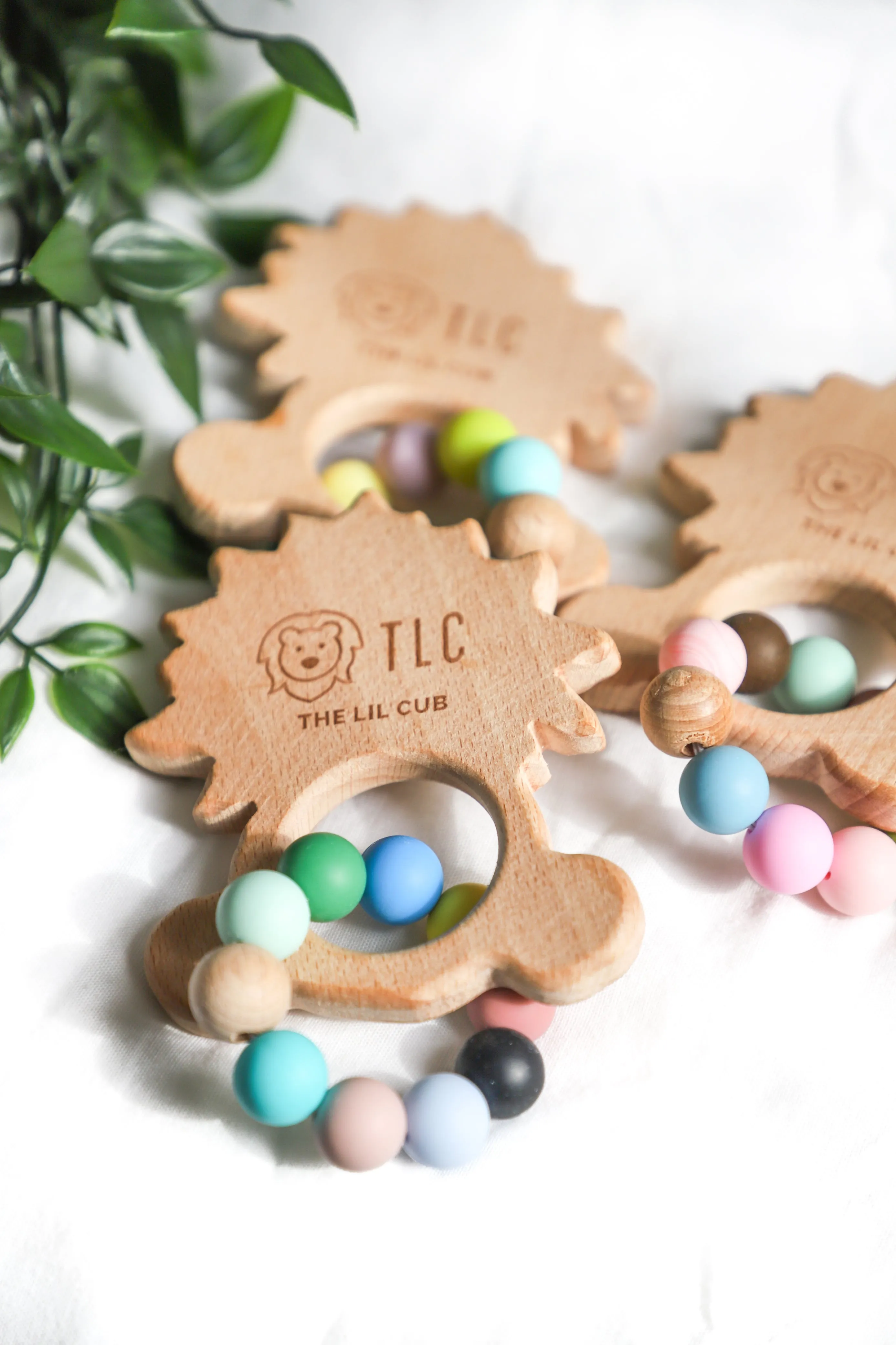 The Lil Cub Wooden teether with silicone beads