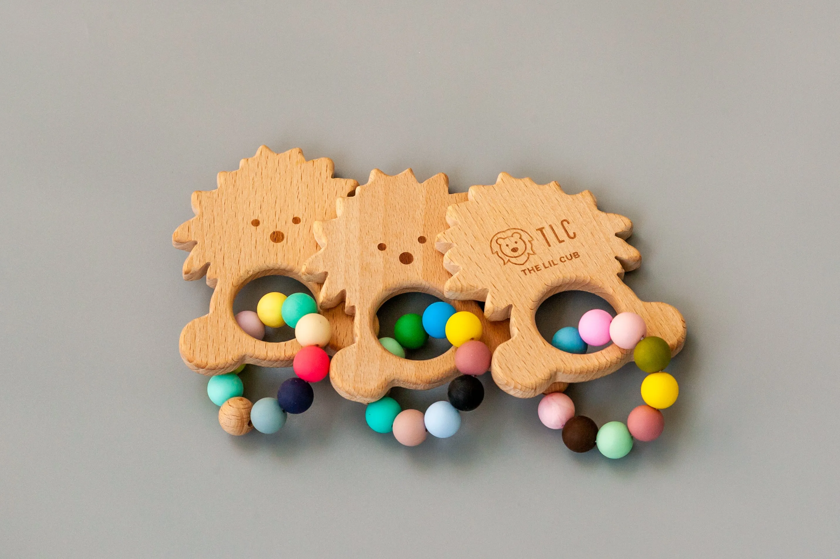 The Lil Cub Wooden teether with silicone beads